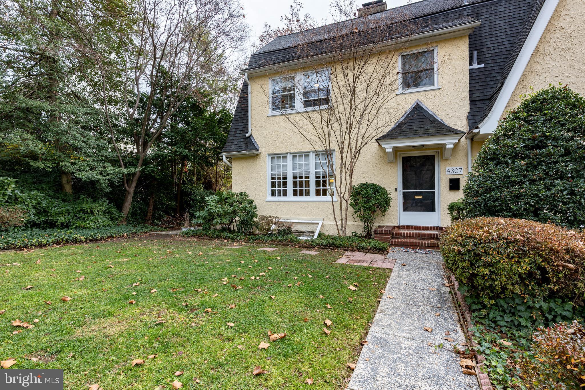 4307 Wickford Road Baltimore, MD 21210 - Photo 1 of 38 a front view of a house with a yard