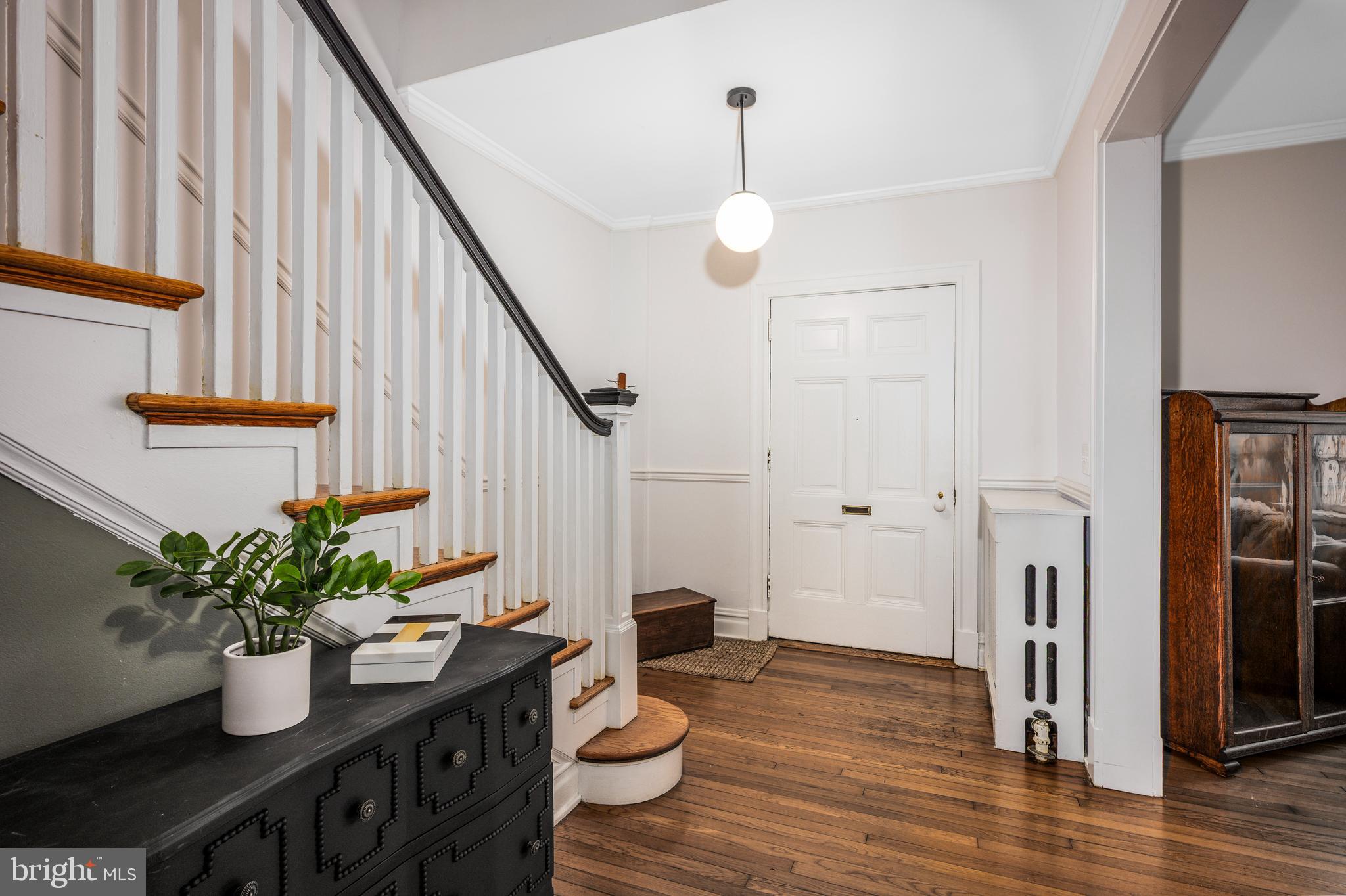 4307 Wickford Road Baltimore, MD 21210 - Photo 2 of 38 a dining room with furniture and wooden floor