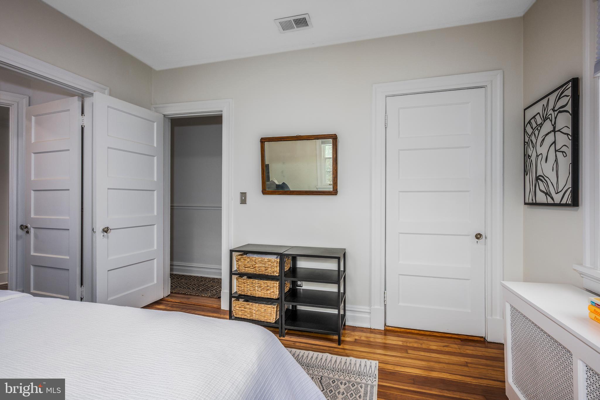 4307 Wickford Road Baltimore, MD 21210 - Photo 23 of 38 a bedroom with a bed and a cabinets