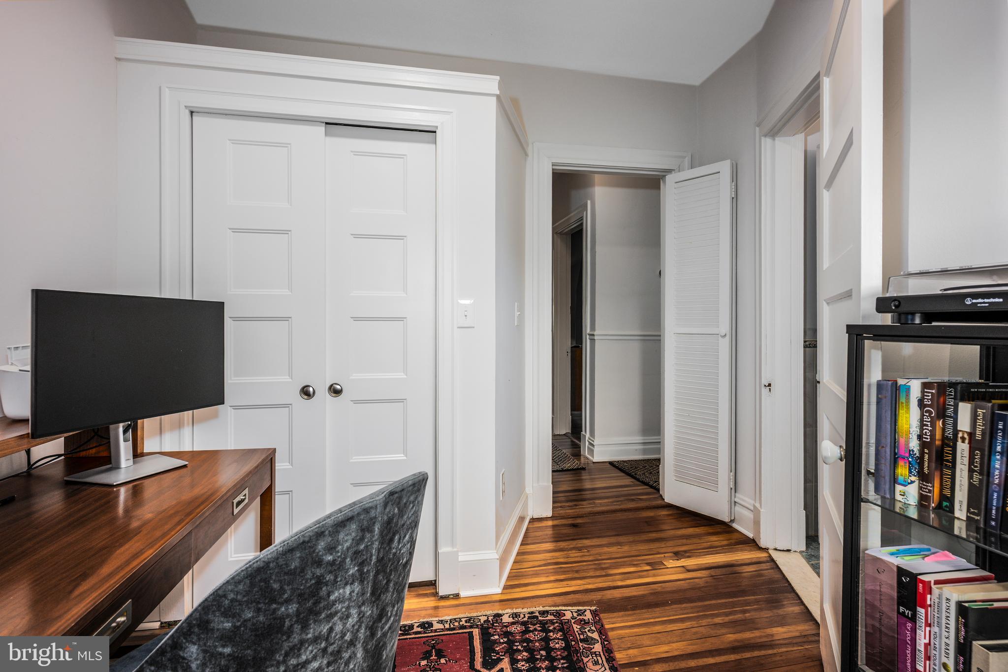 4307 Wickford Road Baltimore, MD 21210 - Photo 26 of 38 a view of a livingroom with furniture and an empty room