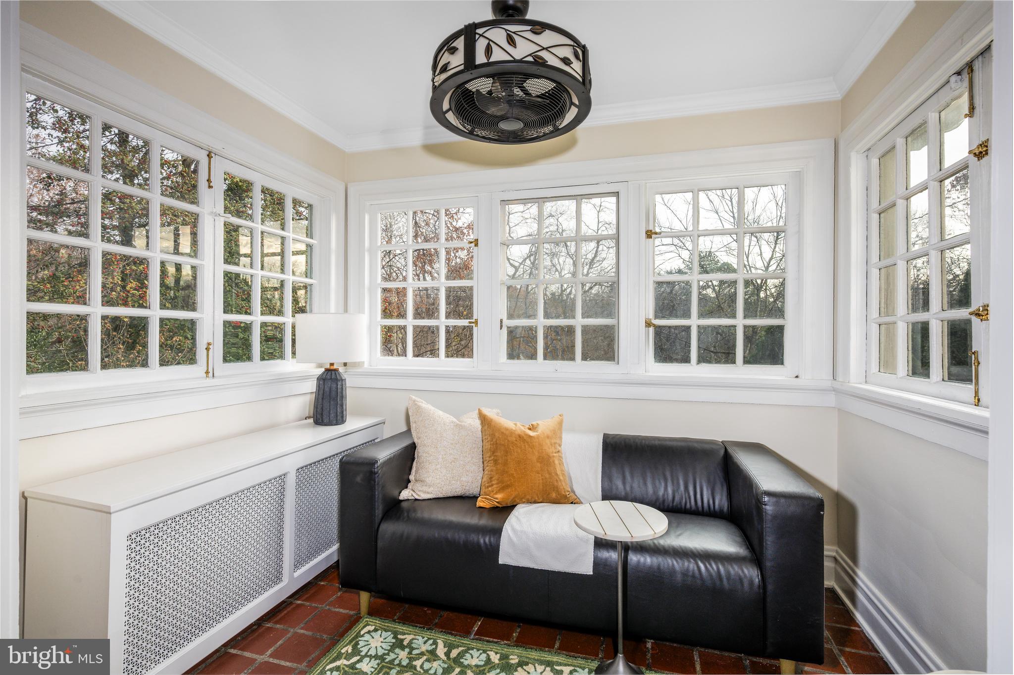 4307 Wickford Road Baltimore, MD 21210 - Photo 10 of 38 a living room with furniture and a large window