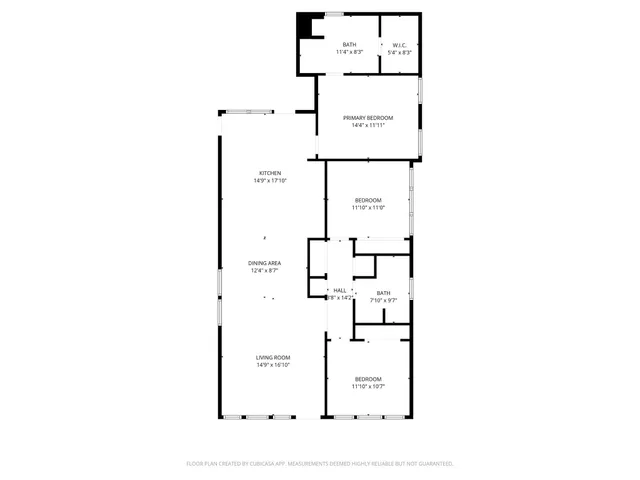 a picture of a bench in front of a wall