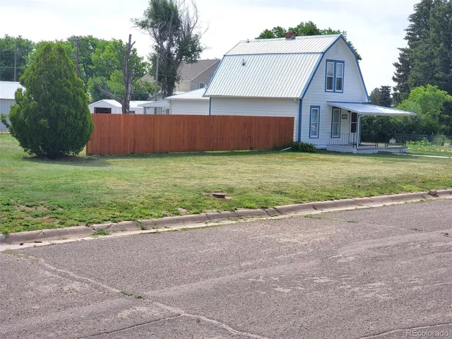 front view of house with a yard