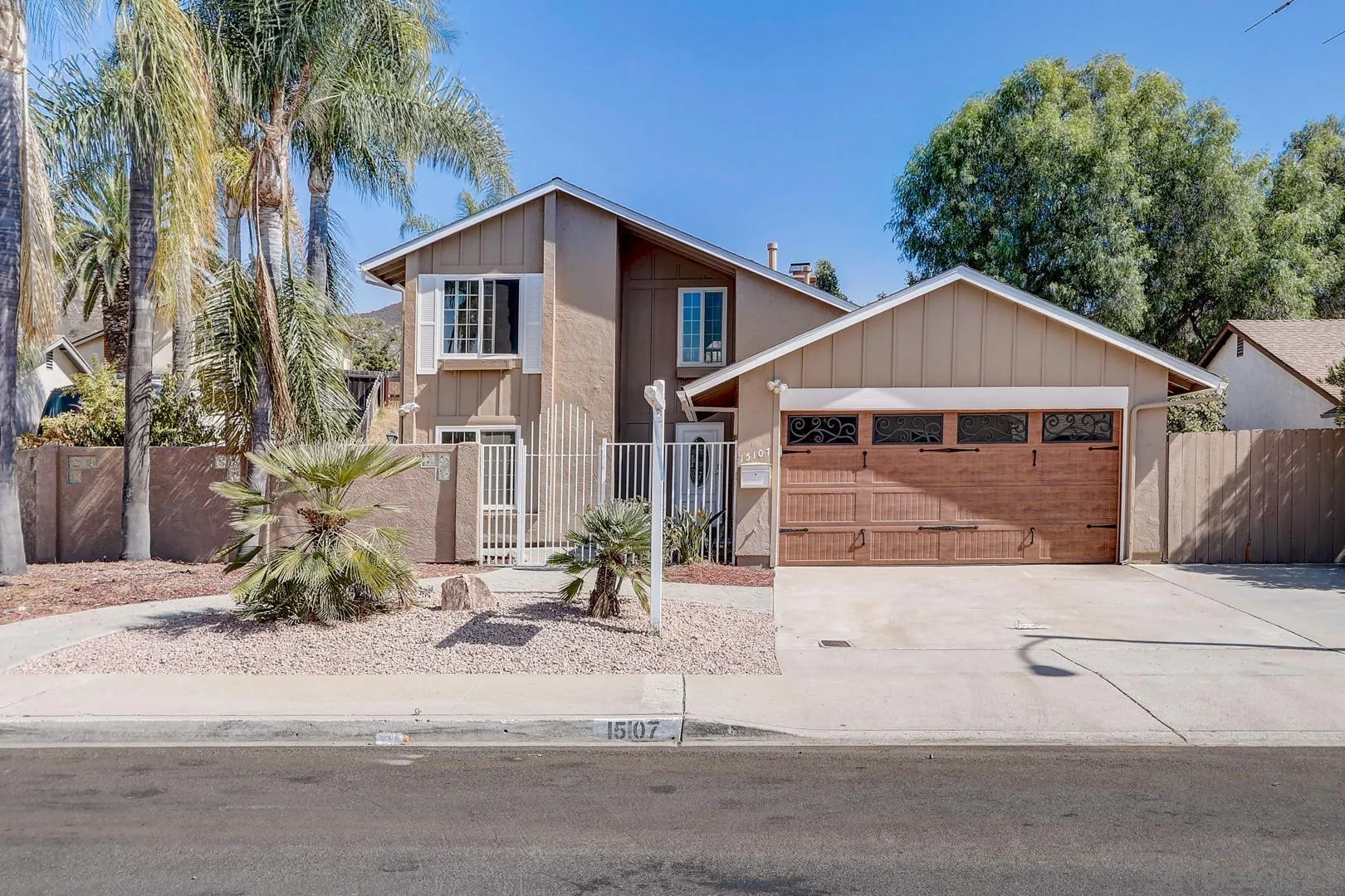 front view of a house with a small yard