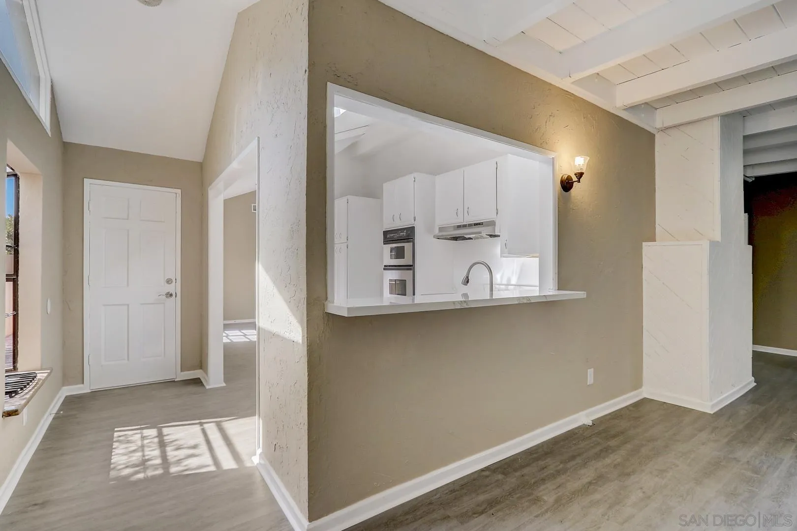 15107 Hesta Street Poway, CA 92064 - Photo 14 of 23 a view of a hallway with bathroom