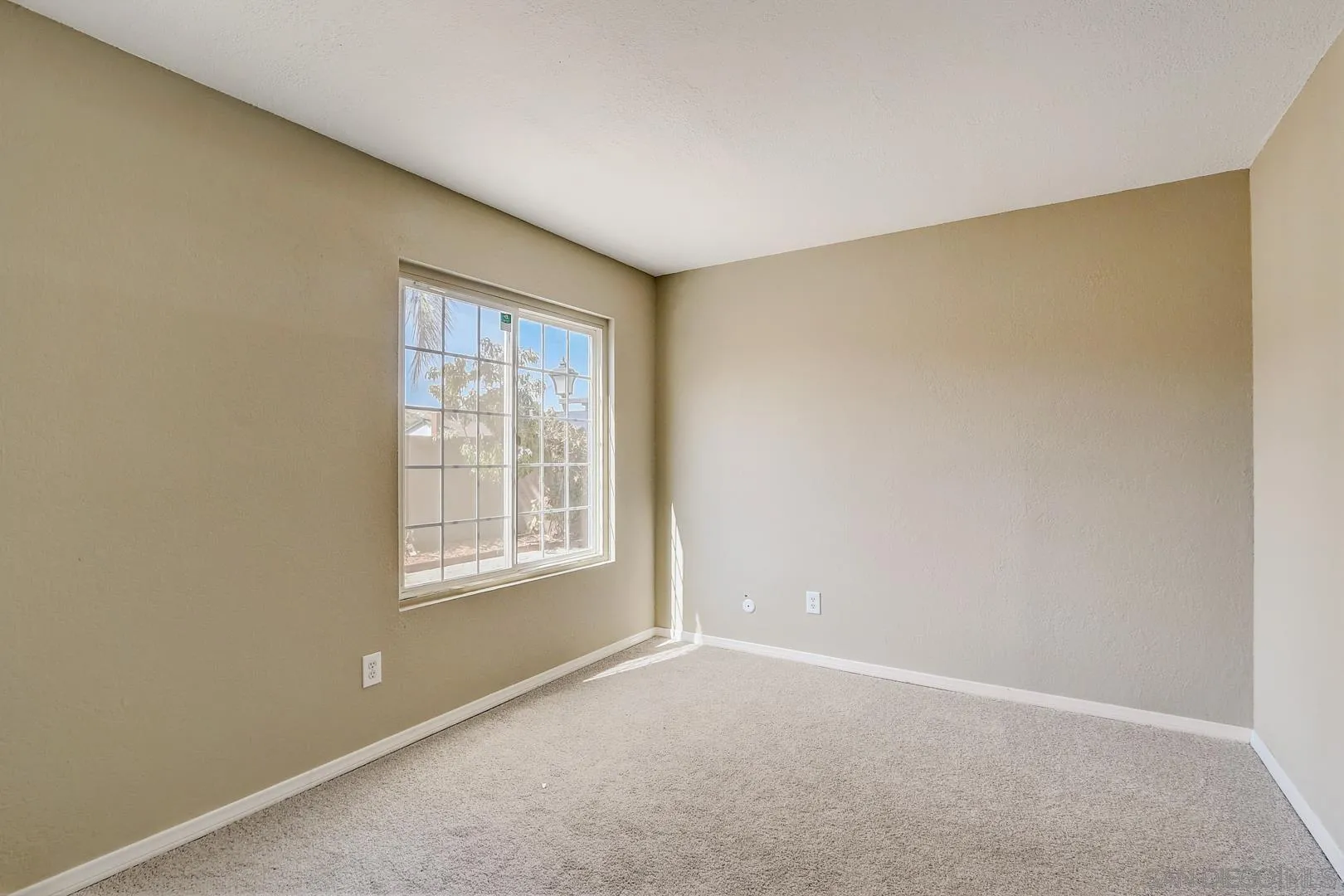 15107 Hesta Street Poway, CA 92064 - Photo 22 of 23 a view of an empty room with a window