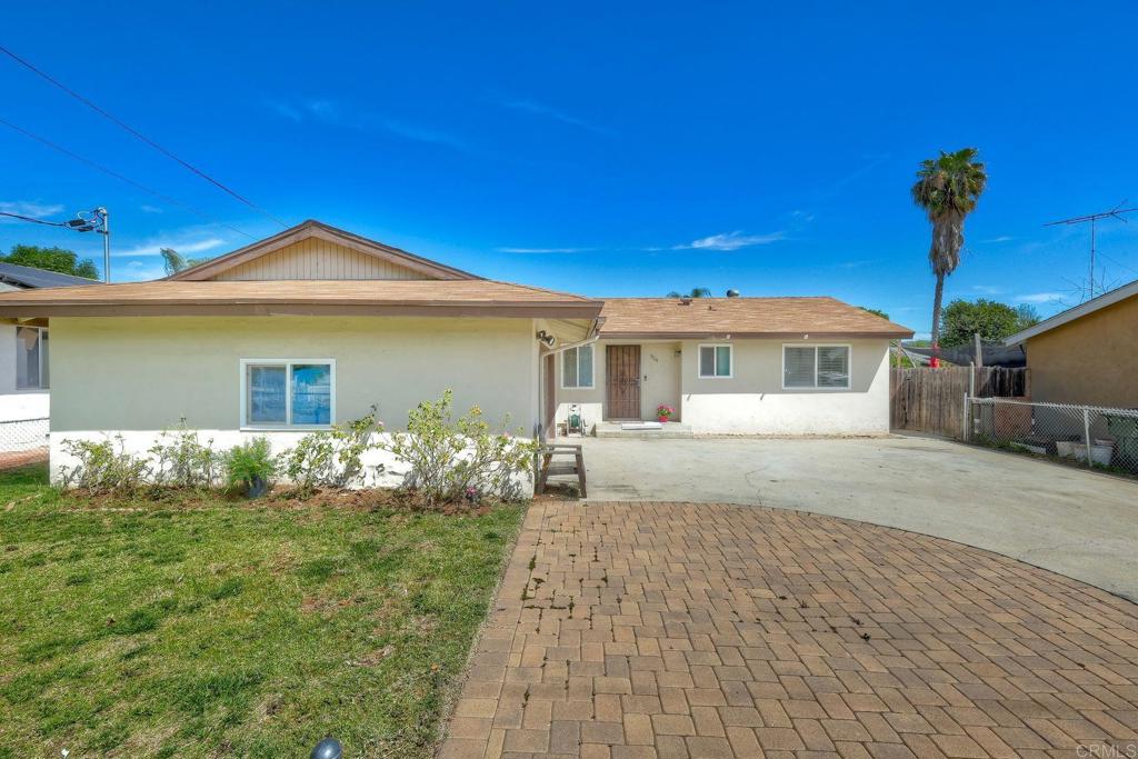 924 Daisy Street Escondido, CA 92027 - Photo 19 of 25 a front view of a house with garden