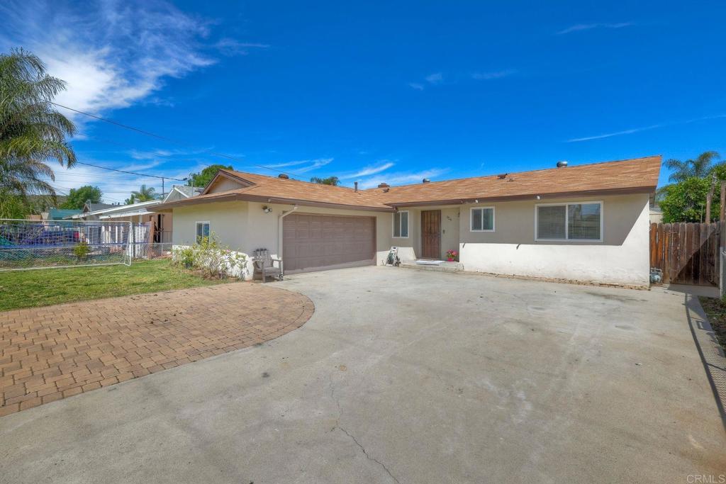 924 Daisy Street Escondido, CA 92027 - Photo 20 of 25 a front view of a house with a yard