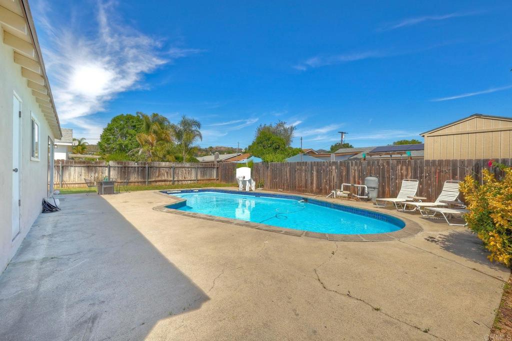 924 Daisy Street Escondido, CA 92027 - Photo 23 of 25 a view of a swimming pool with a lounge chairs