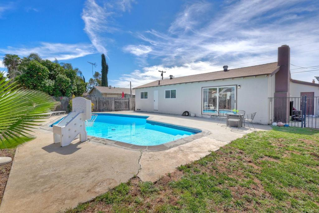 924 Daisy Street Escondido, CA 92027 - Photo 24 of 25 a swimming pool with outdoor seating yard and barbeque oven