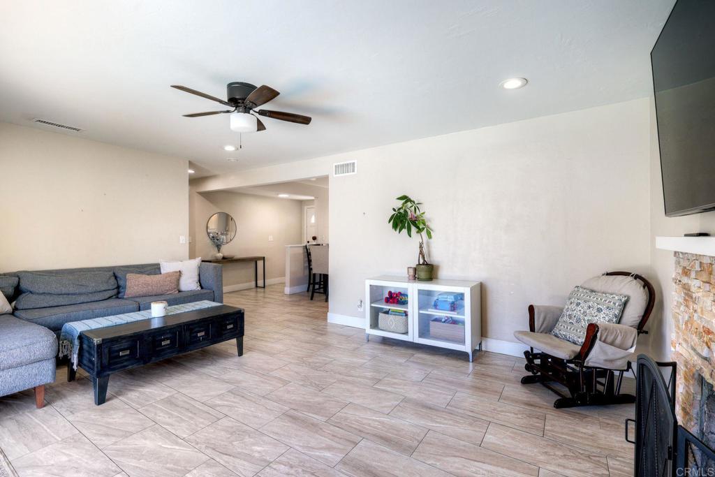 924 Daisy Street Escondido, CA 92027 - Photo 7 of 25 a living room with furniture and a flat screen tv