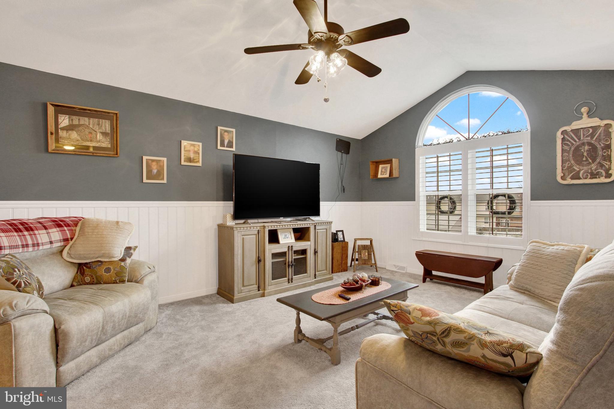 2790 Butternut Lane York, PA 17408 - Photo 4 of 30 a living room with furniture and a flat screen tv