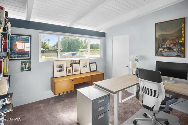 a view of a dining room with furniture large window and wooden floor