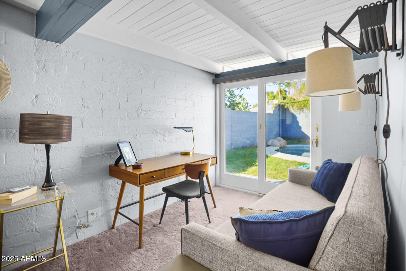 1504 East Rancho Drive Phoenix, AZ 85014 - Photo 7 of 10 a living room with furniture and a lamp
