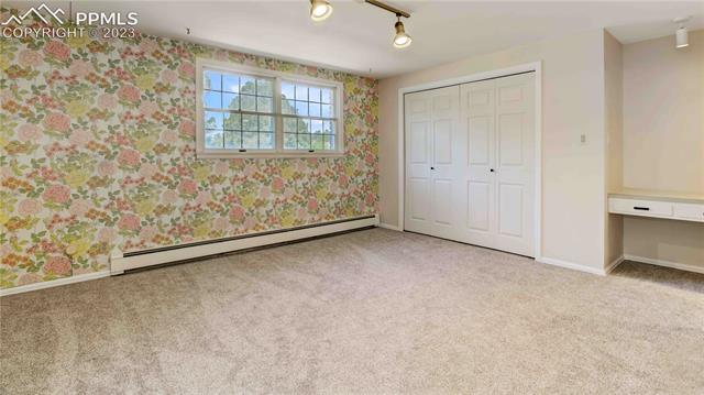 5417 Madera Road Colorado Springs, CO 80918 - Photo 30 of 43 Lower Level Bedroom 1