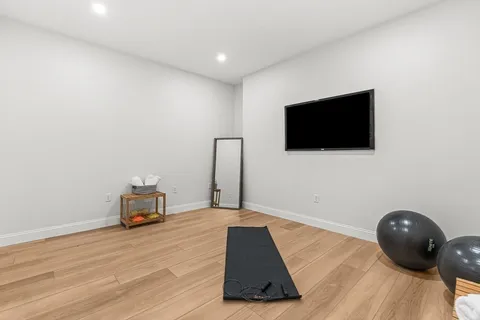 a living room with a flat screen tv