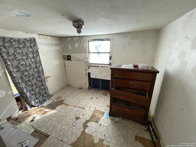 a room with furniture and a window