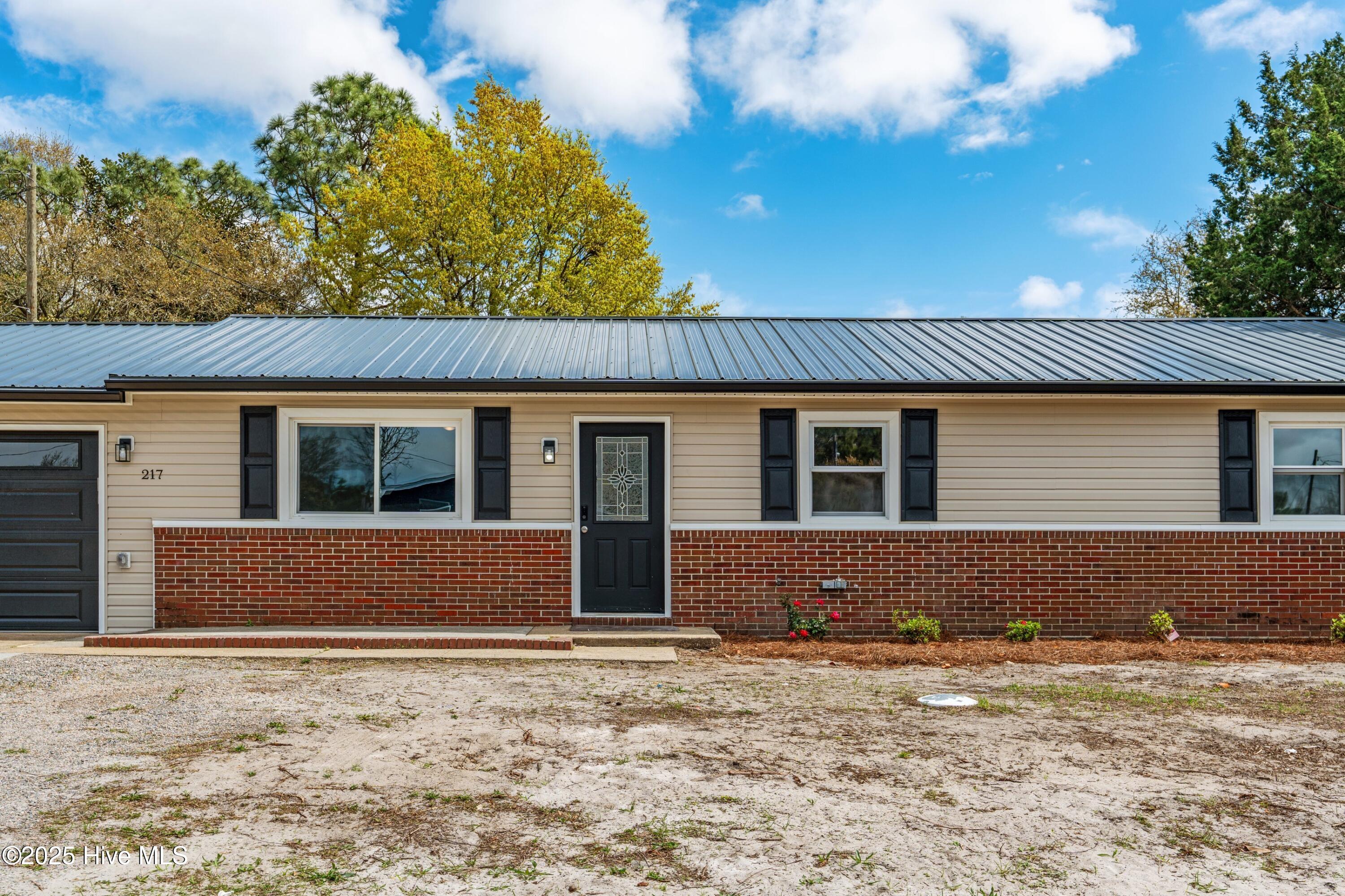 217 Cathay Road Wilmington, NC 28412 - Photo 2 of 29 027-217CathayRoad-Wilmington-NC-28412-SM