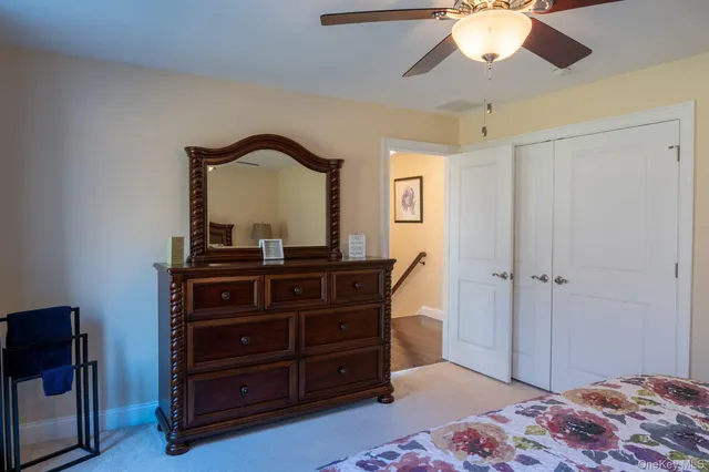 a bedroom with a bed and television