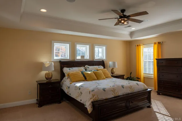 a bedroom with a bed and a lamp