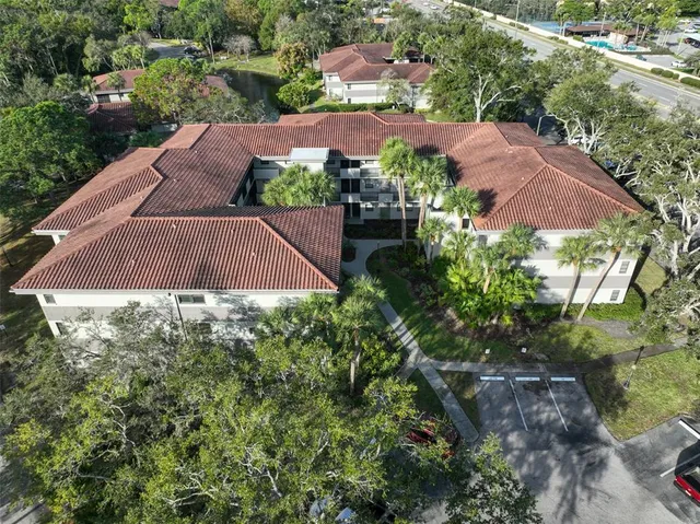 an aerial view of house with yard