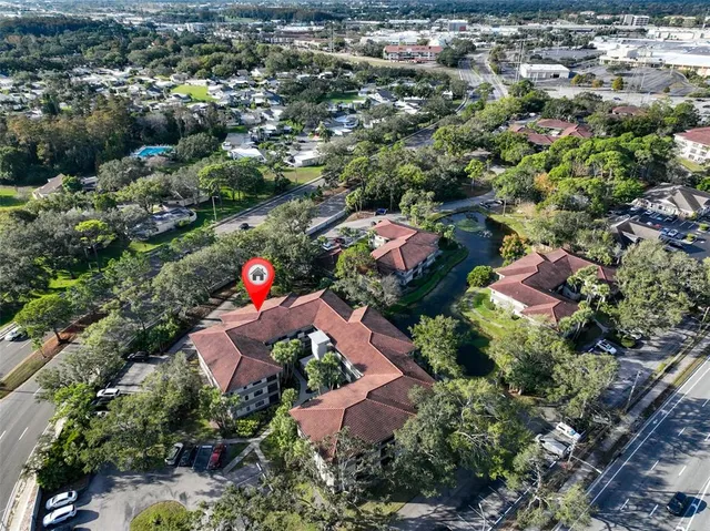 an aerial view of residential house with outdoor space