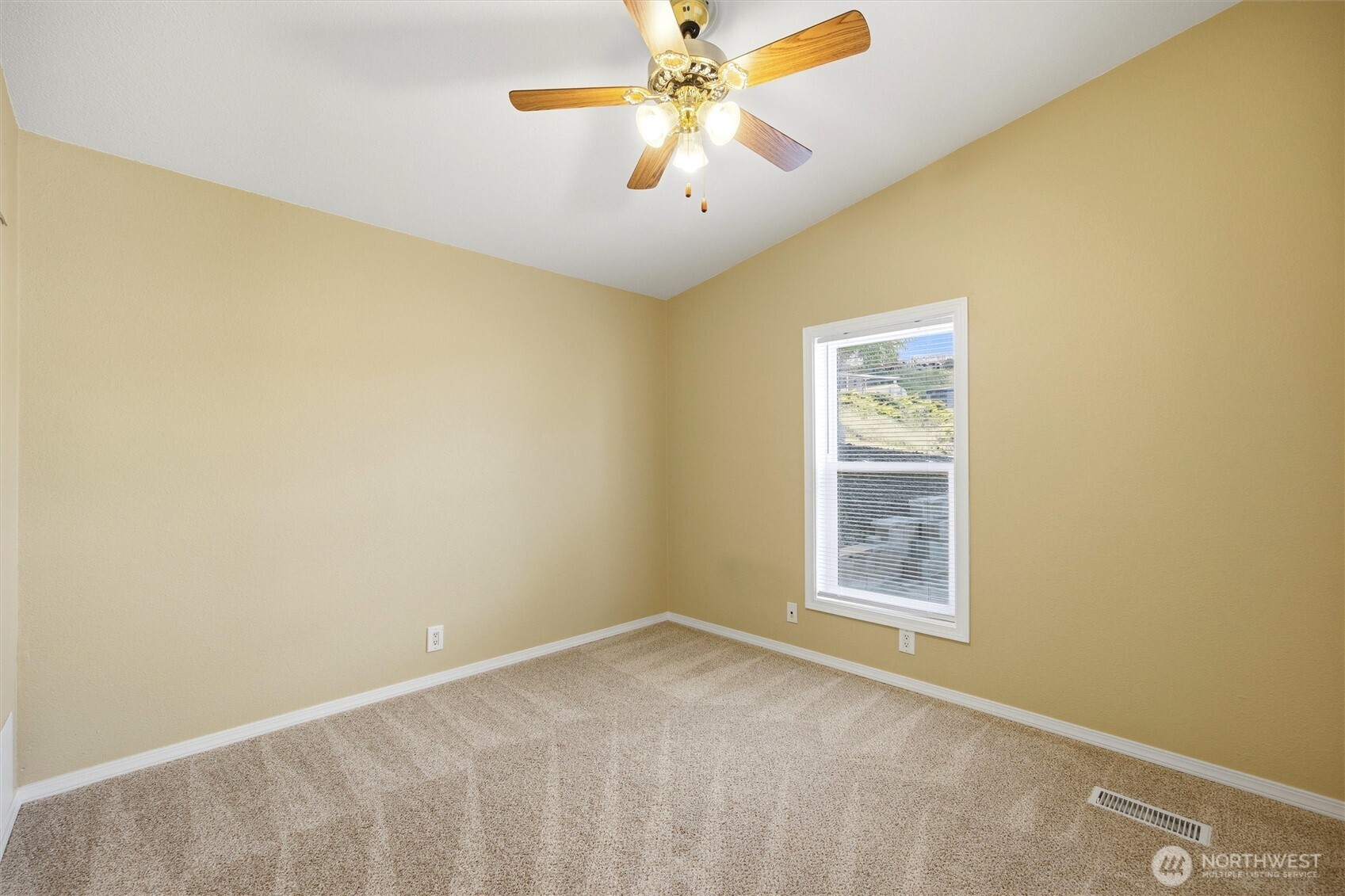 49 Ridgecliff Drive Richland, WA 99352 - Photo 18 of 29 an empty room with a window and a ceiling fan