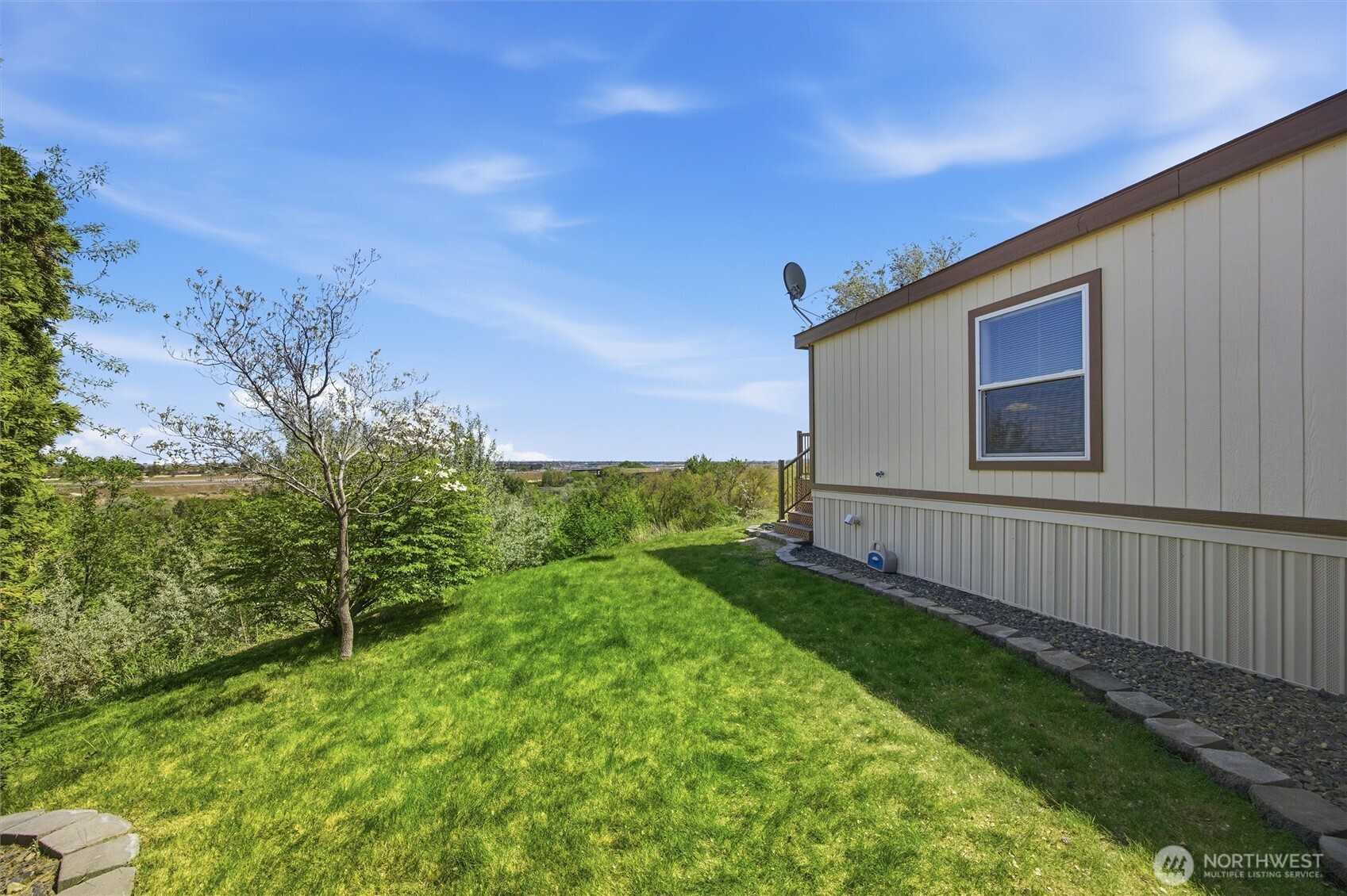 49 Ridgecliff Drive Richland, WA 99352 - Photo 22 of 29 a view of a backyard