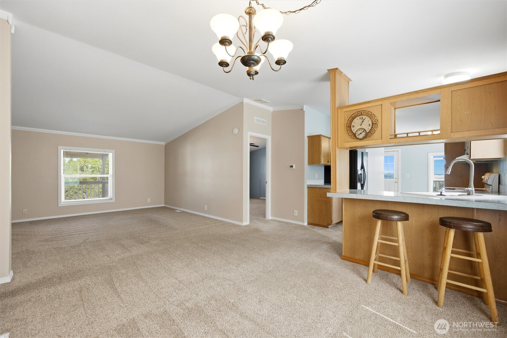 49 Ridgecliff Drive Richland, WA 99352 - Photo 5 of 29 a view of kitchen with a table and chandelier