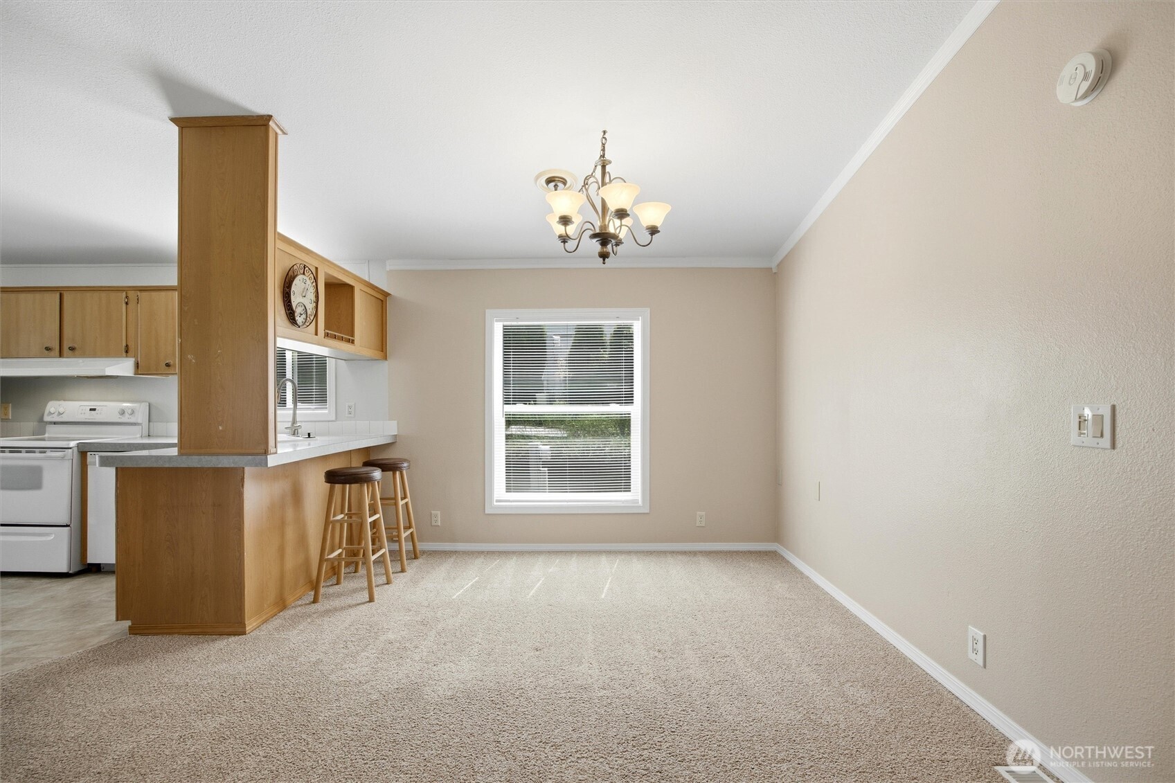 49 Ridgecliff Drive Richland, WA 99352 - Photo 6 of 29 an empty room with fireplace and windows