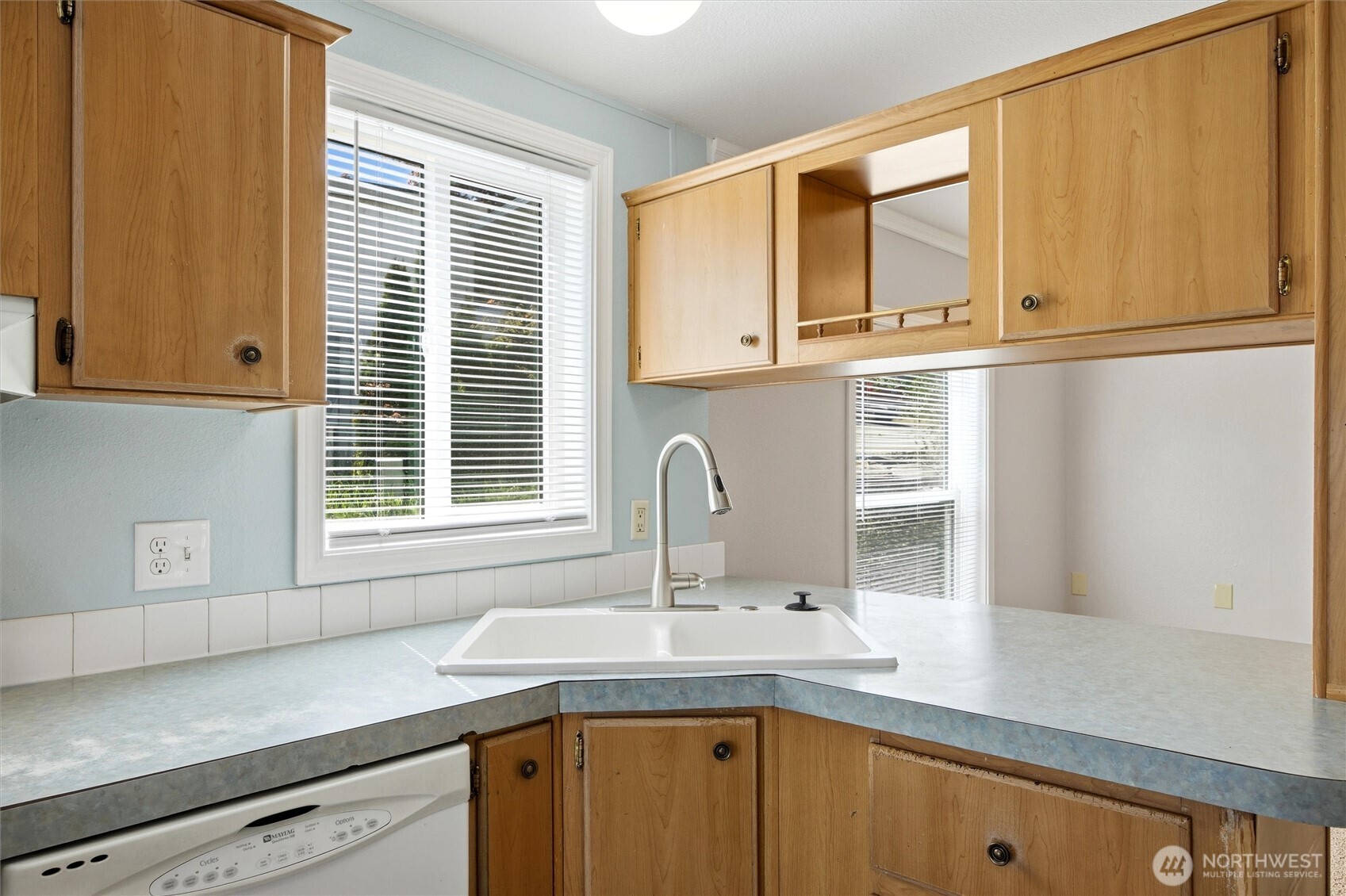49 Ridgecliff Drive Richland, WA 99352 - Photo 8 of 29 a kitchen with a sink and cabinets