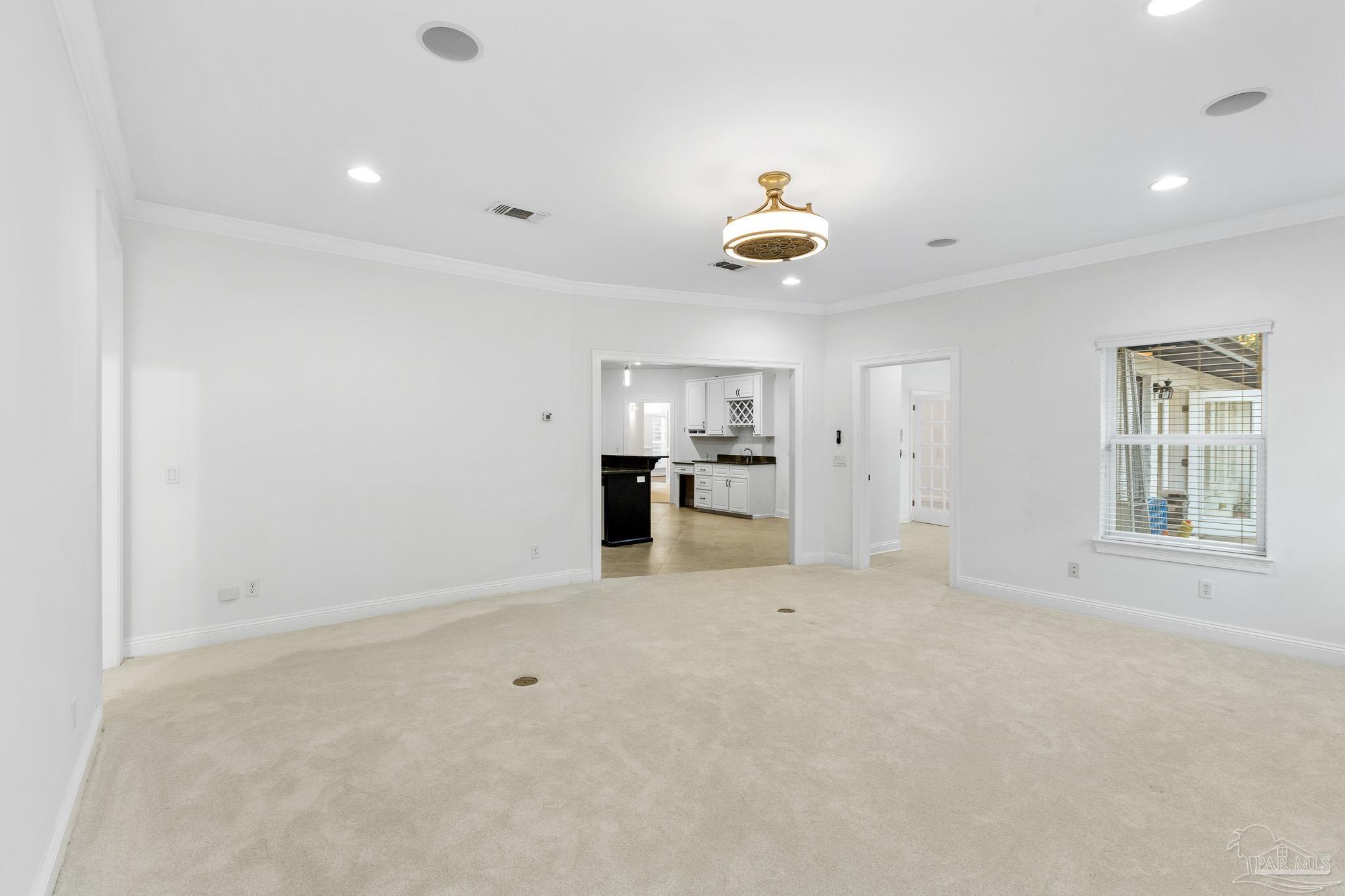 6786 Quintette Road Pace, FL 32571 - Photo 21 of 60 a view of an empty room with a window