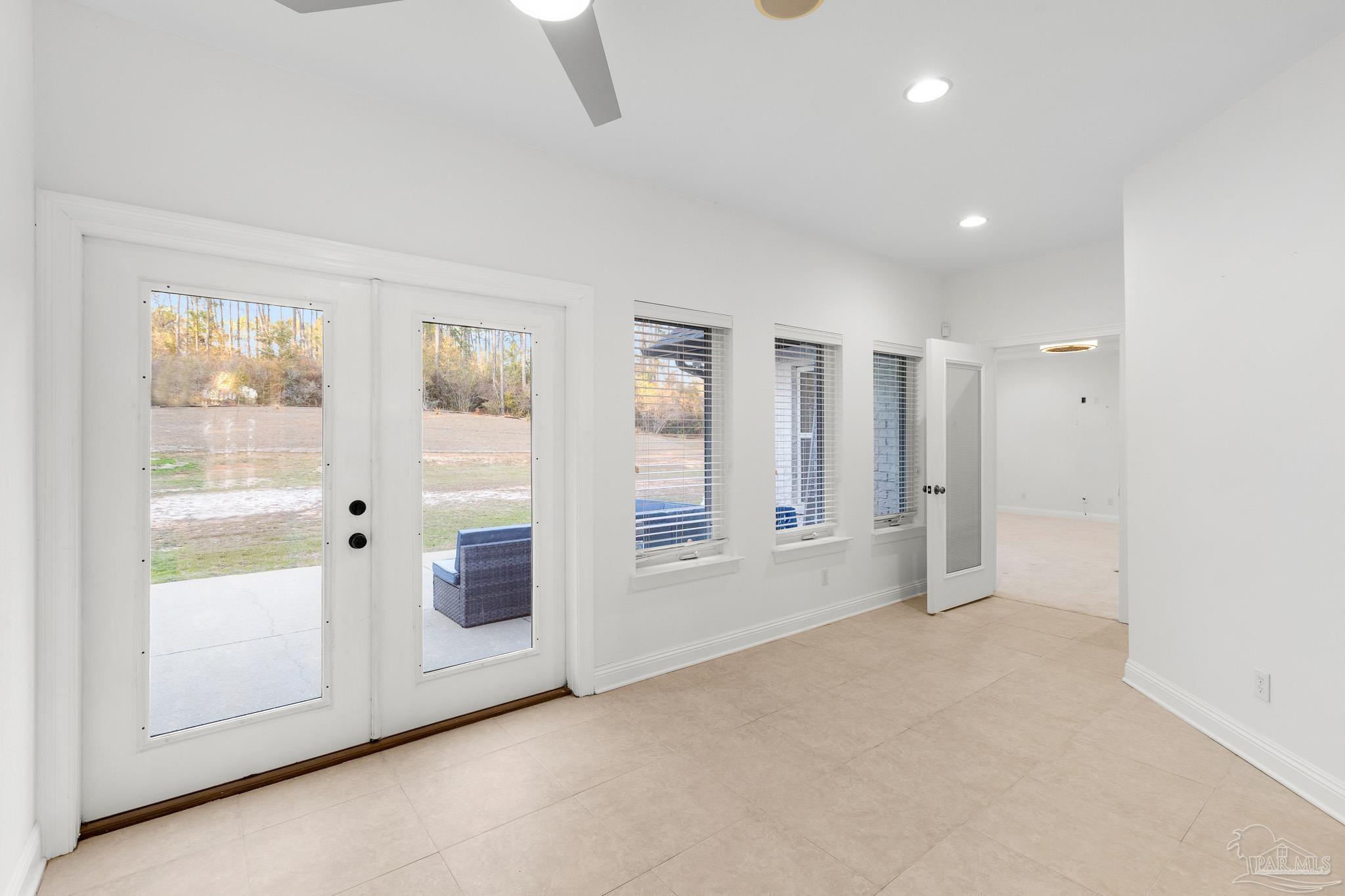 6786 Quintette Road Pace, FL 32571 - Photo 25 of 60 a view of an empty room with a window