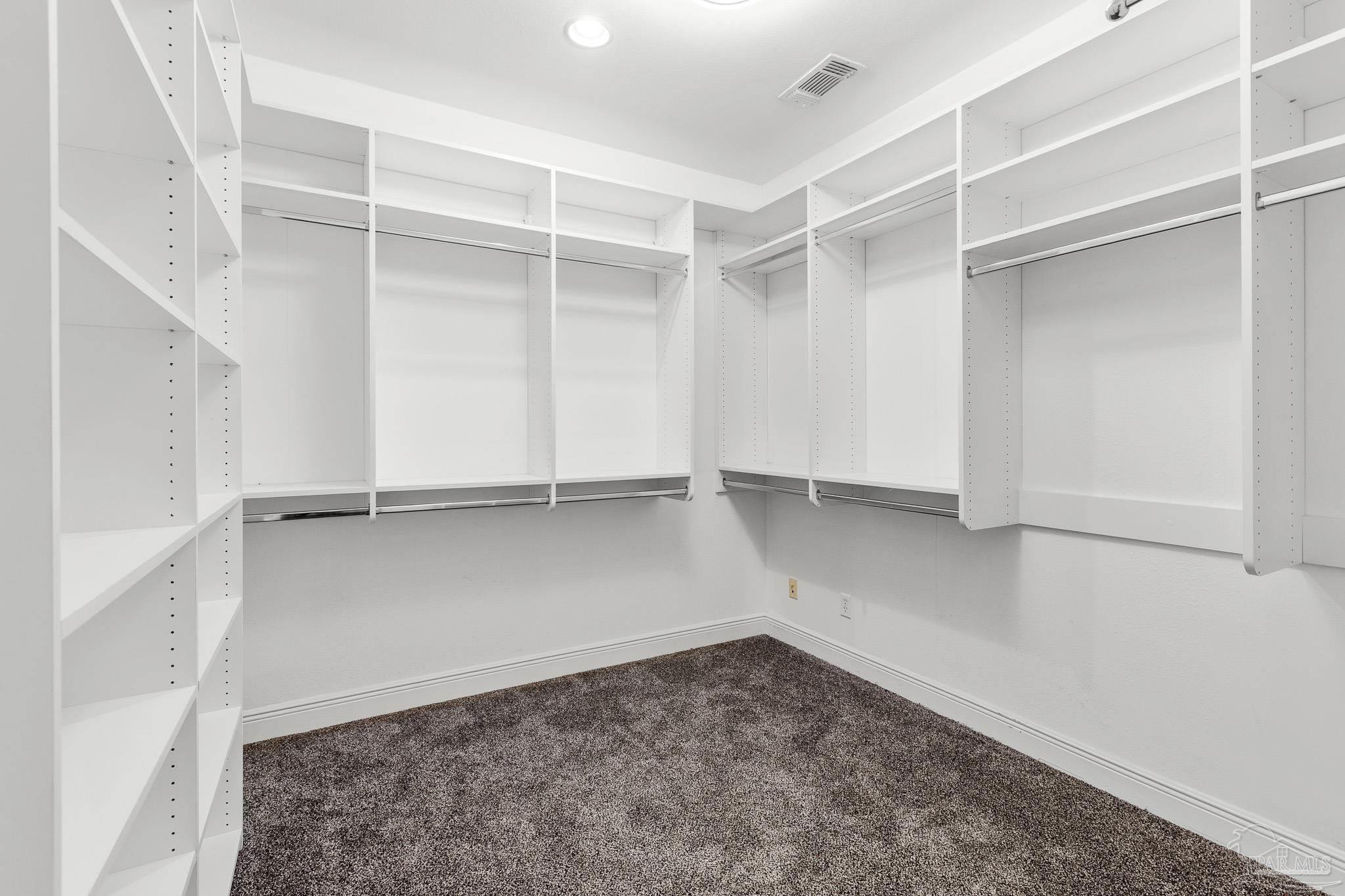 6786 Quintette Road Pace, FL 32571 - Photo 31 of 60 a view of an empty walk in closet