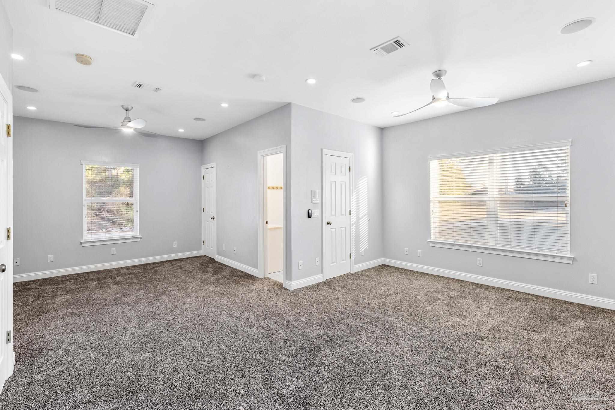 6786 Quintette Road Pace, FL 32571 - Photo 35 of 60 a view of an empty room with a window