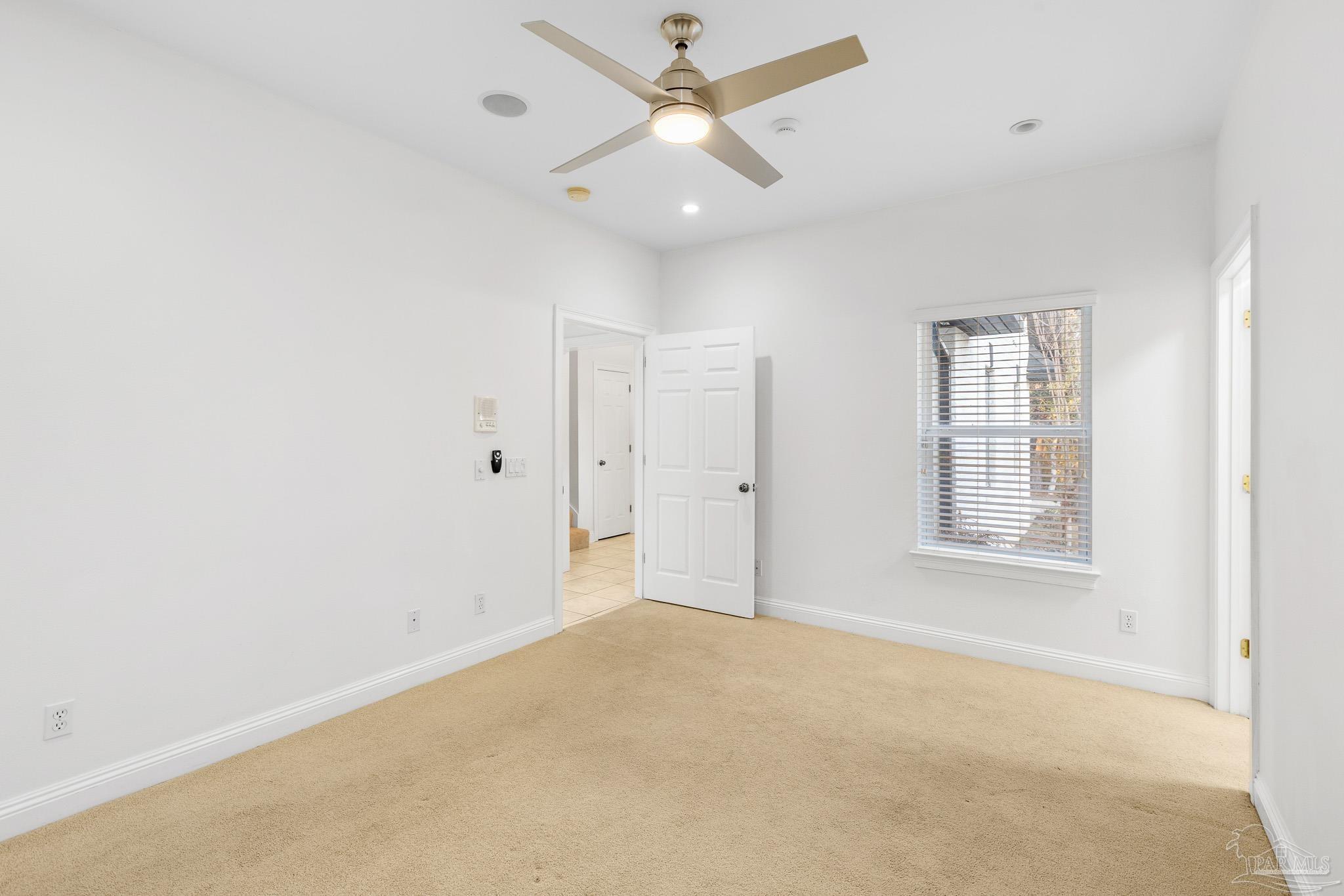 6786 Quintette Road Pace, FL 32571 - Photo 42 of 60 a view of an empty room with a window