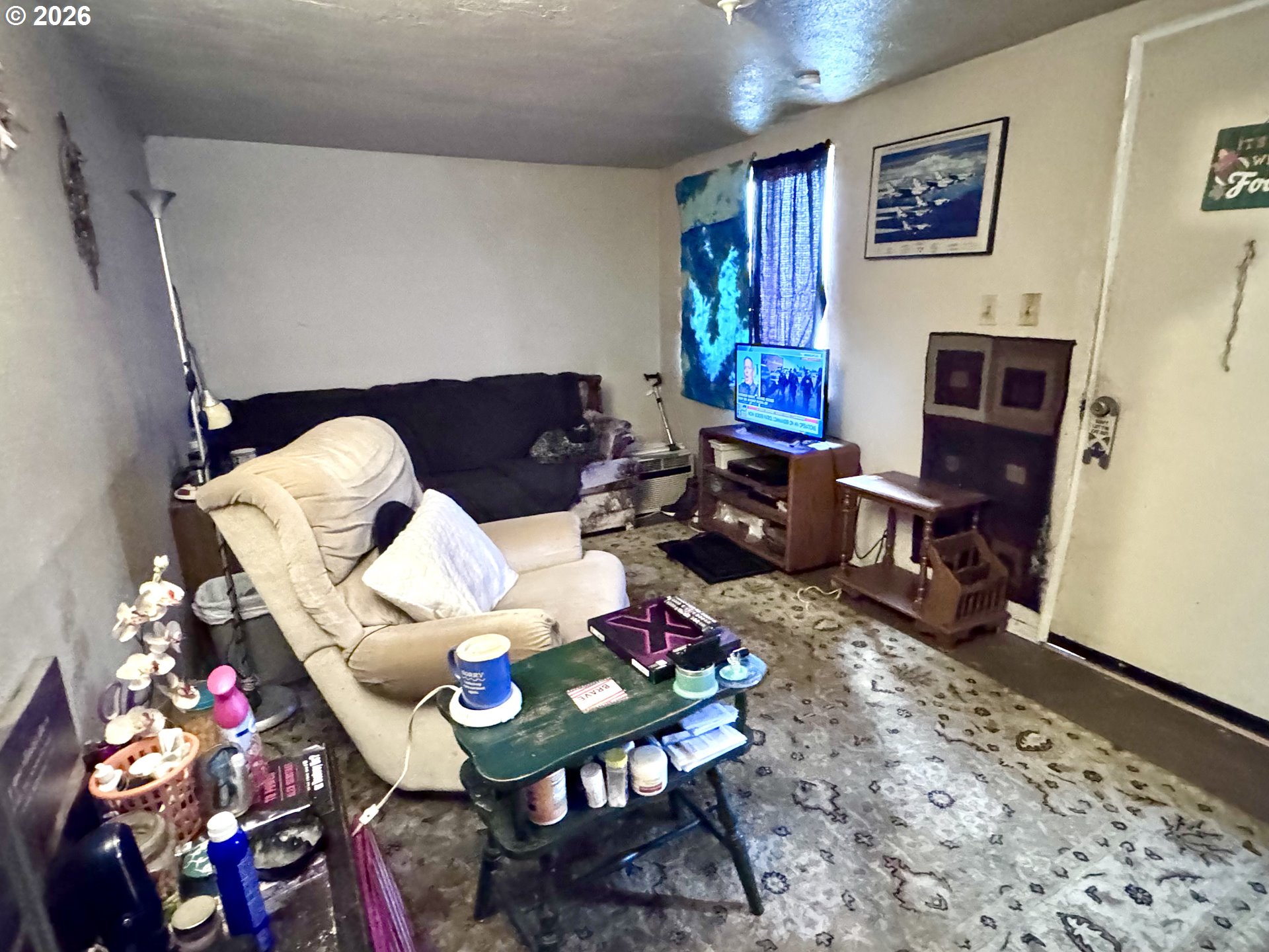 306 4th Street Baker City, OR 97814 - Photo 2 of 11 a living room with furniture and wooden floor