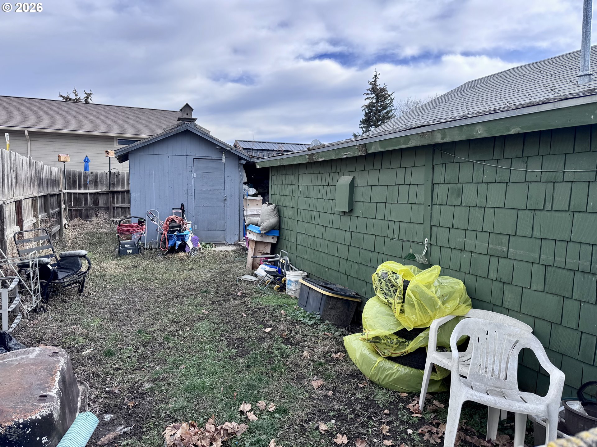 306 4th Street Baker City, OR 97814 - Photo 9 of 11 a view of a backyard with a tv and outdoor seating