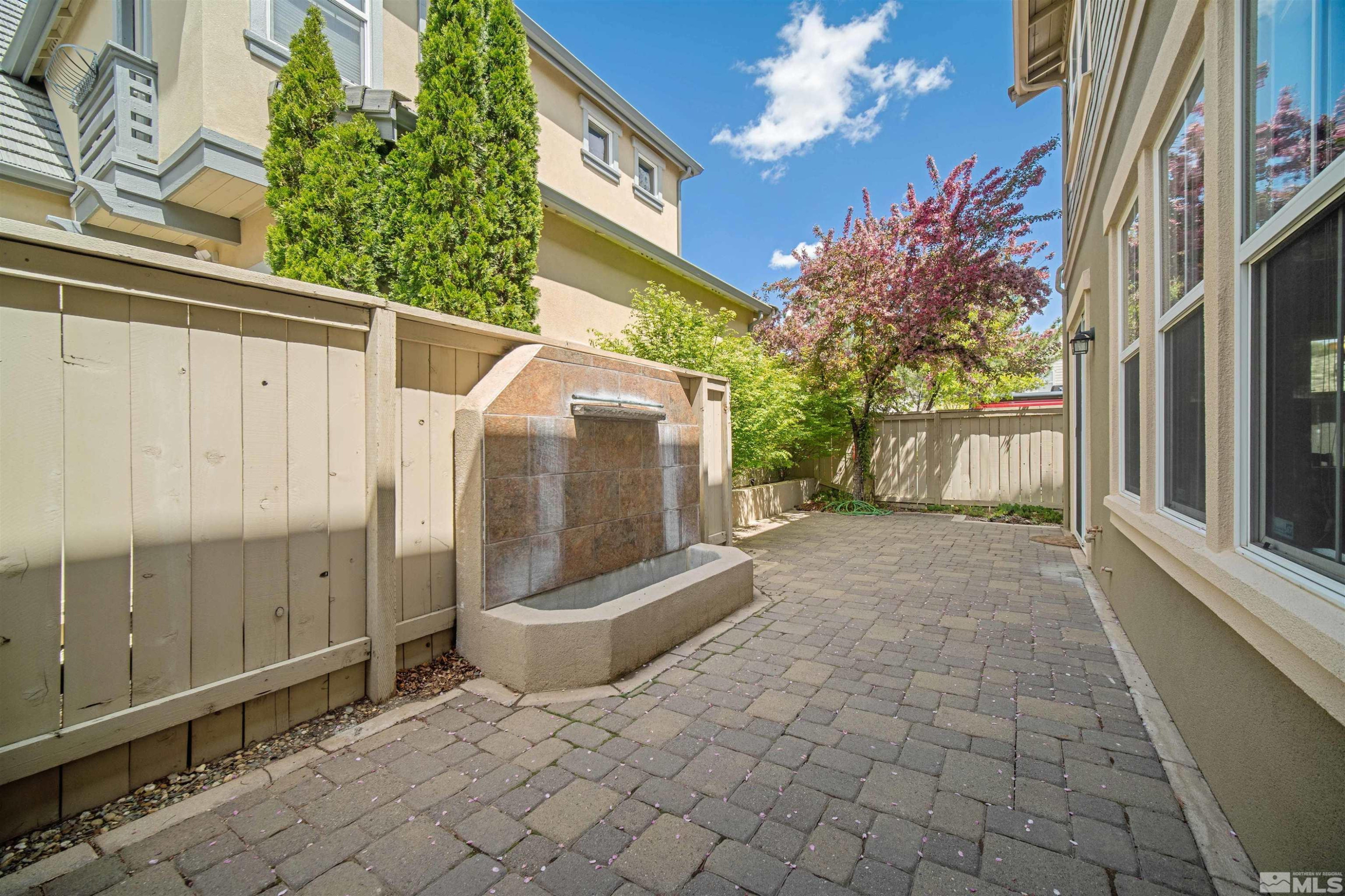 7609 Stone Bluff Way Reno, NV 89523 - Photo 18 of 40 a view of a porch with a tree
