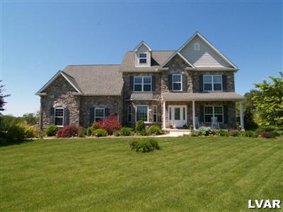 158 Fox Ridge Nazareth, PA 18064 - Photo 1 of 27 a front view of a residential houses with yard and green space