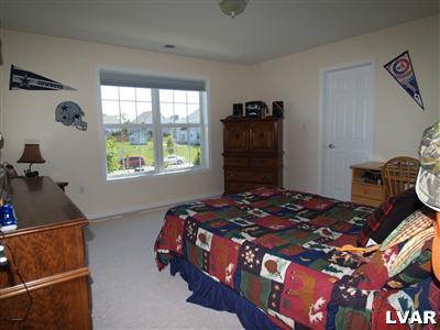 158 Fox Ridge Nazareth, PA 18064 - Photo 14 of 27 a bedroom with a bed and a window