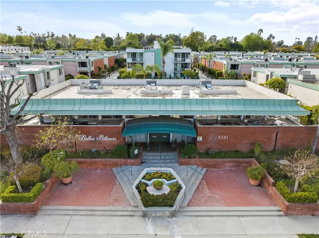 a aerial view of a house with swimming pool
