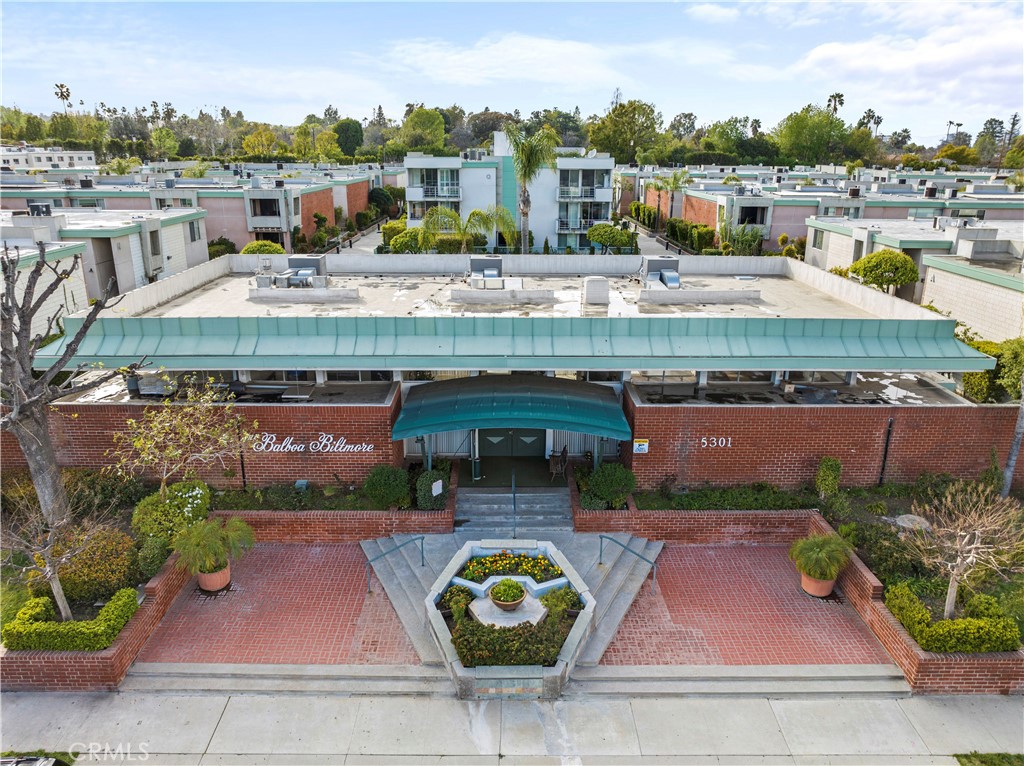 a aerial view of a house with swimming pool