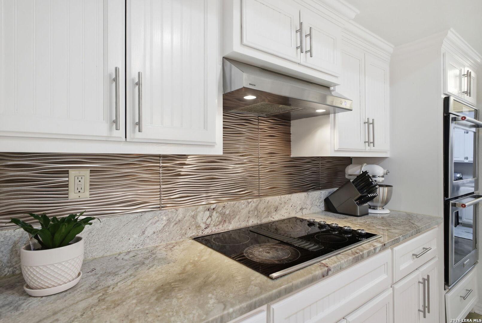 14502 Circle A Trail Helotes, TX 78023 - Photo 18 of 50 a kitchen with a sink and cabinets