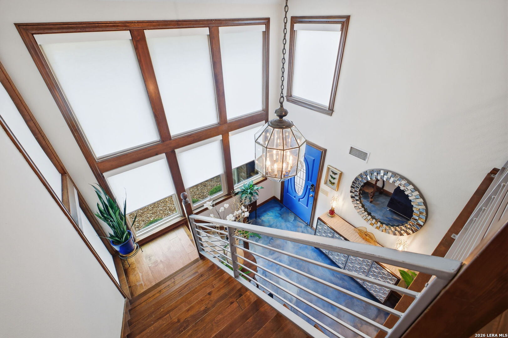 14502 Circle A Trail Helotes, TX 78023 - Photo 20 of 50 a view of stairs and with wooden floor