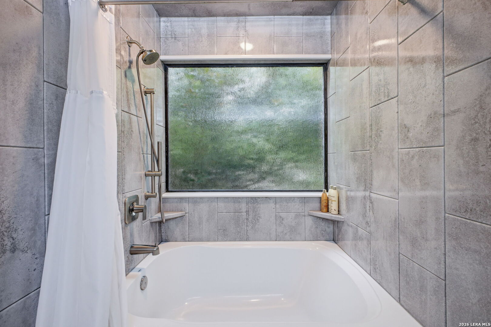 14502 Circle A Trail Helotes, TX 78023 - Photo 23 of 50 a bath tub sitting next to a shower