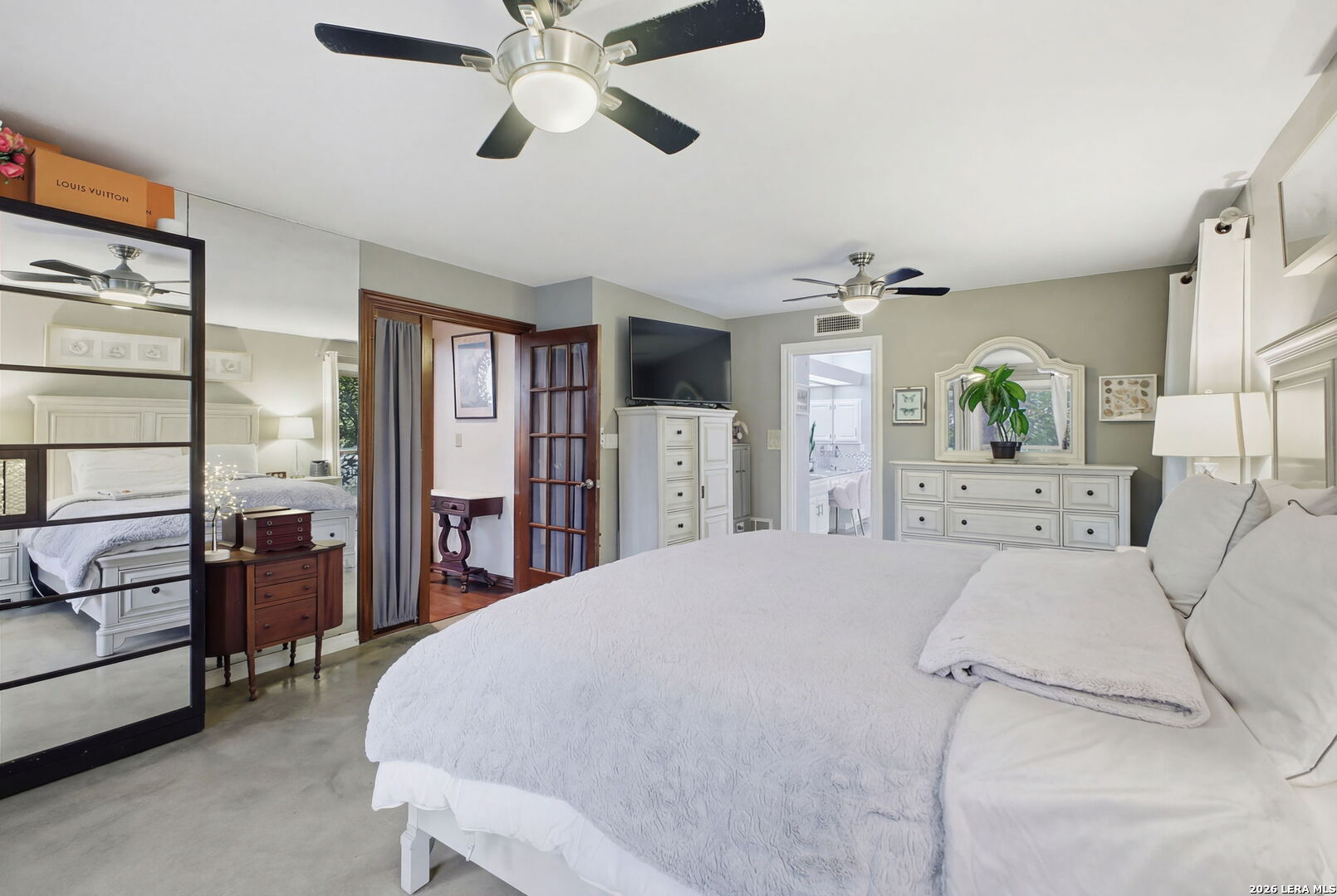 14502 Circle A Trail Helotes, TX 78023 - Photo 26 of 50 a bed room with a bed and a flat screen tv