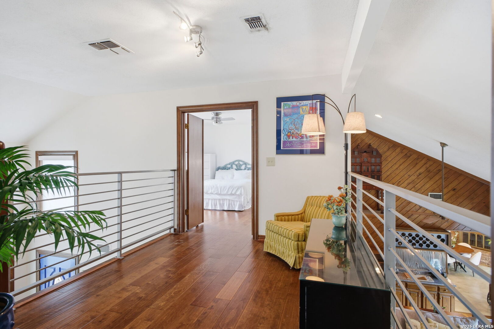14502 Circle A Trail Helotes, TX 78023 - Photo 29 of 50 a view of entryway and hall with wooden floor