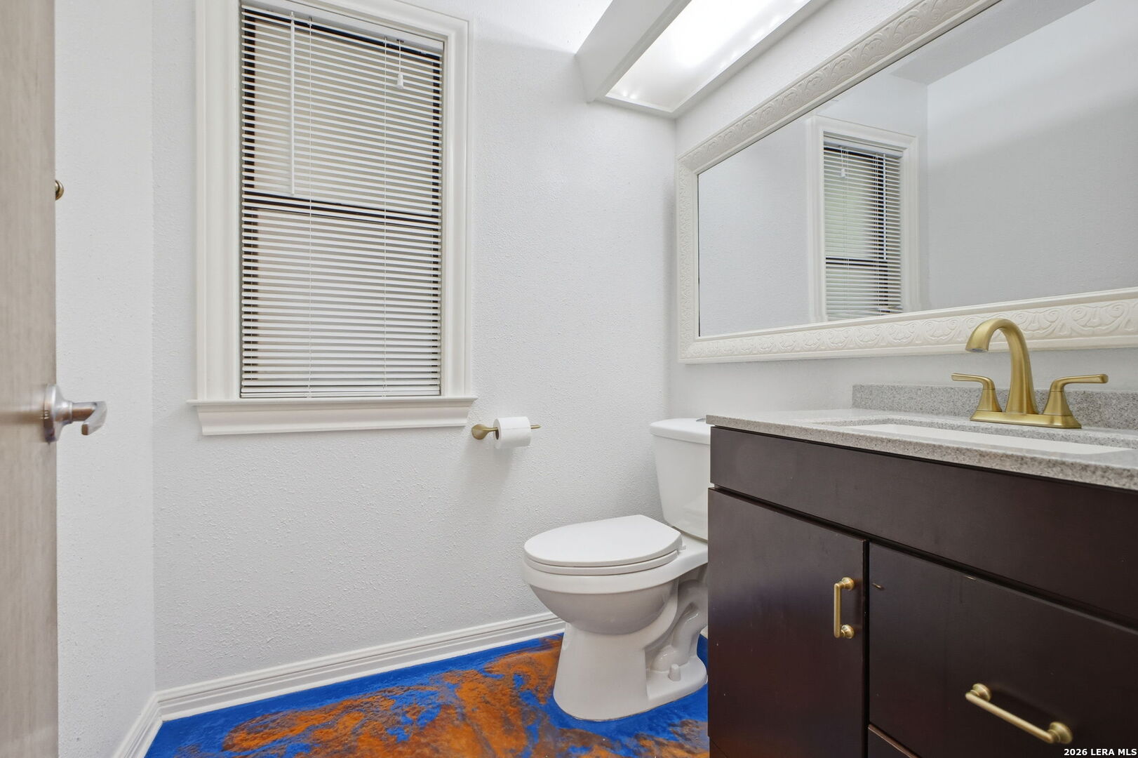 14502 Circle A Trail Helotes, TX 78023 - Photo 30 of 50 a bathroom with a sink and a toilet