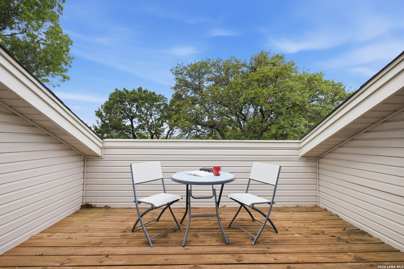 14502 Circle A Trail Helotes, TX 78023 - Photo 32 of 50 a backyard of a house with table and chairs